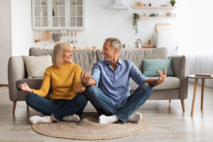 Couple practicing slow breathing and grounding